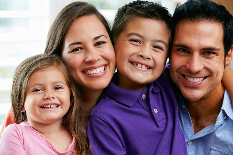 Happy family at dental appointment