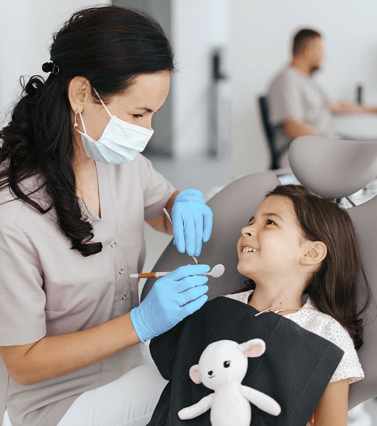 Dentist with child patient